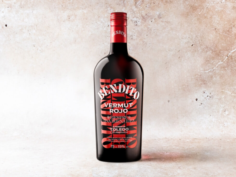 A bottle of Bendito Vermut Rojo on a slate red-brown backdrop