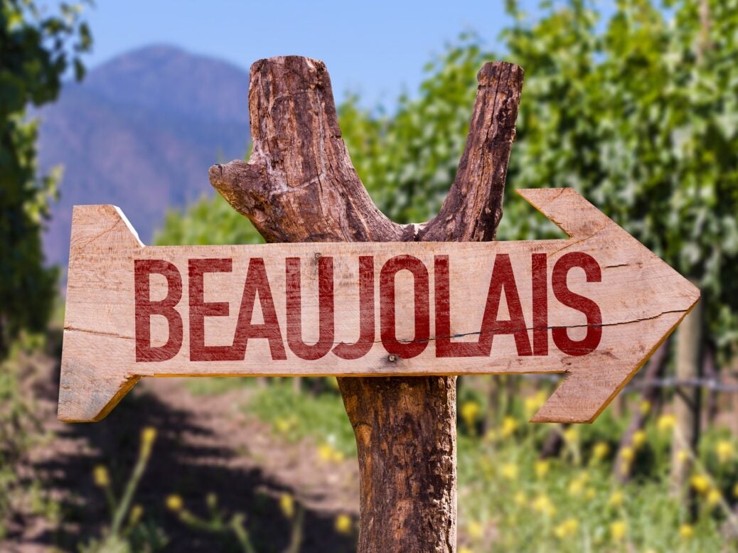 Beaujolais sign with winery in background