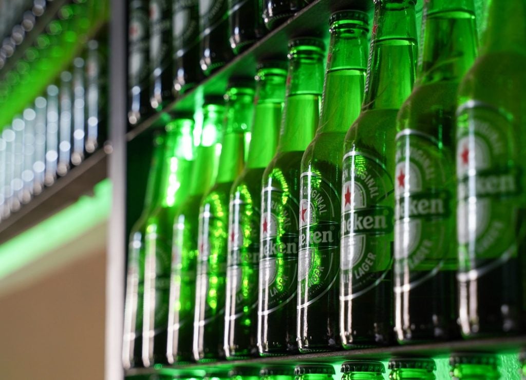 Green Heineken beer bottles in a cerveseria in Querétaro in central Mexico, May 2021