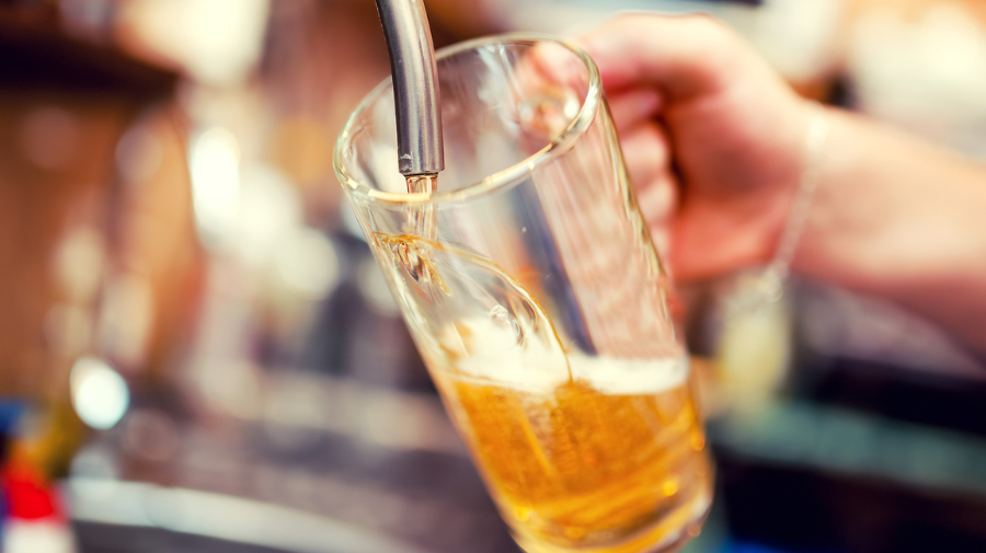 Bartender pouring beer.