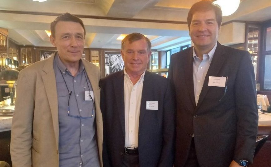 Three Valdivieso staff stand side by side smiling in a London restaurant