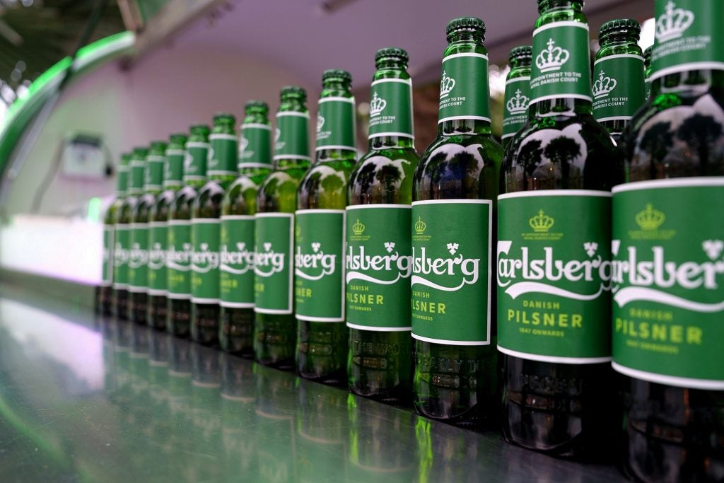 A row of Carlsberg beer bottles