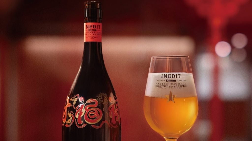 Inedit beer bottle and beer in glass