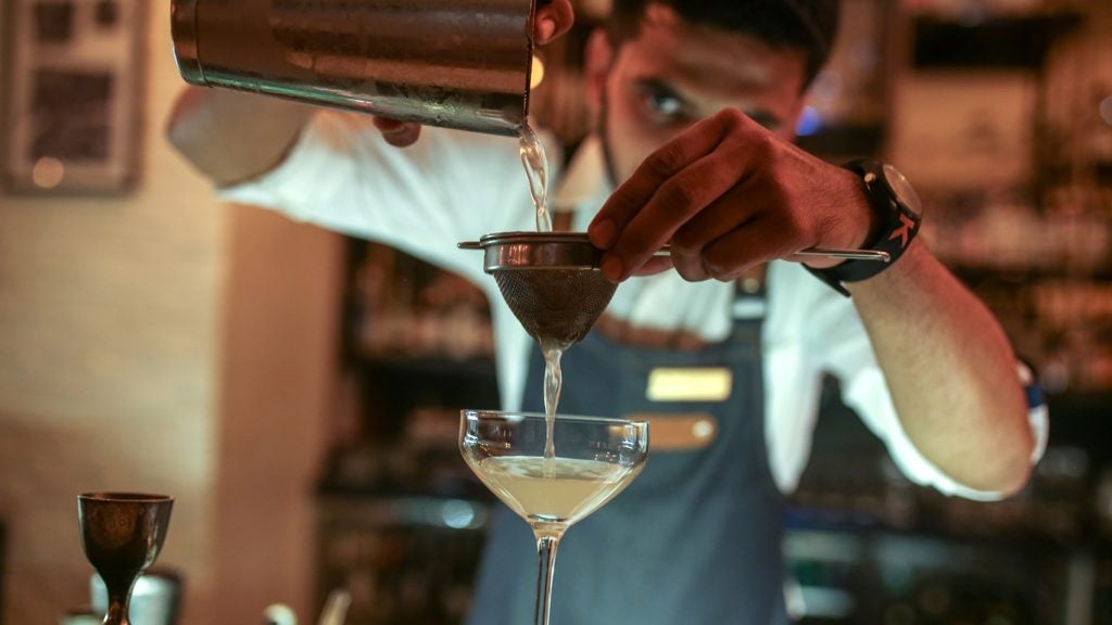 A bartender makes a cocktail at the Quorum club in Mumbai, India, on 19 October 2023. Credit: Dhiraj Singh/Bloomberg via Getty Images
