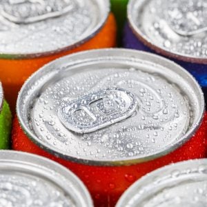 Close-up view of soft drinks cans