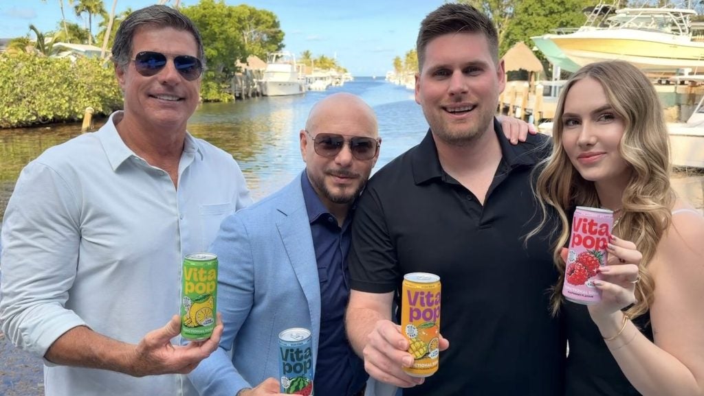 Pitbull (second from the left) has invested in Vita Pop